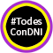 Logo. Círculos concéntricos en violeta, amarillo y negro. Letras en blanco que dicen #TodesConDNI.